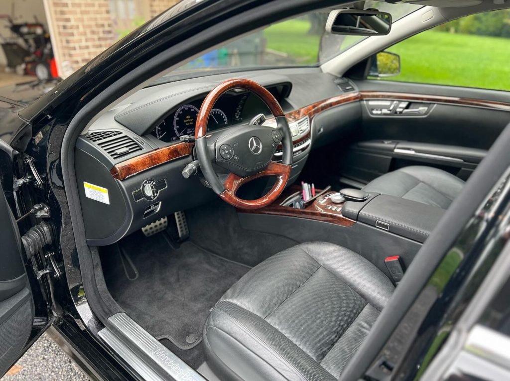Mercedes-Benz interior during odor removal detail in York, PA, showing cleaned front cabin in a mobile on-location service